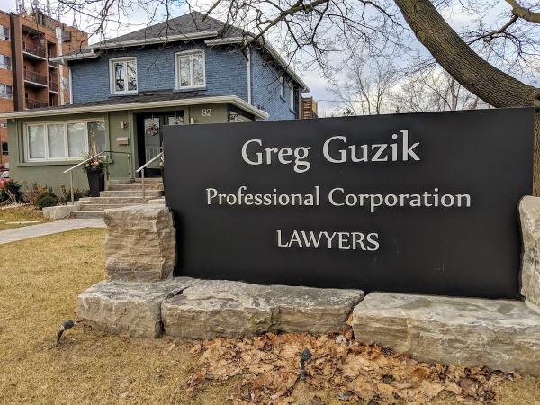 Greg Guzik Professional Corporation